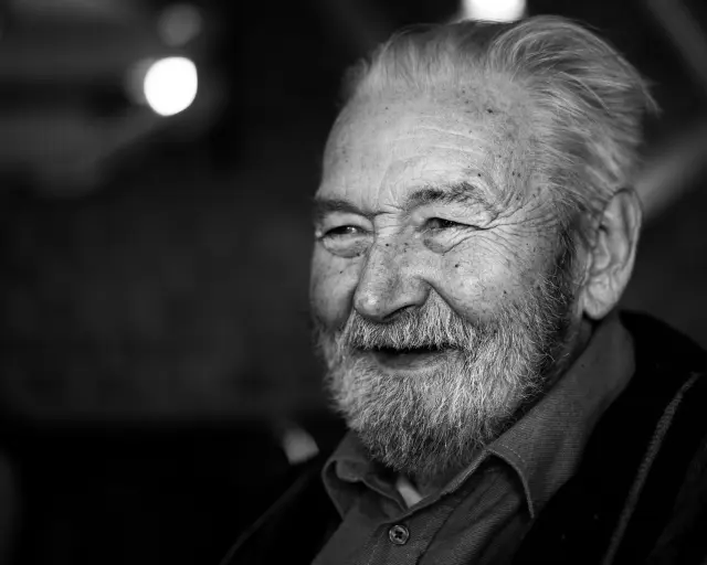 Older man smiling as a memory of your loved one